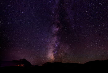 galaxies-sky-night-stars-space-mountain-royalty-free-thumbnail.jpg