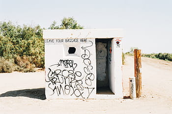 graffiti-no-baggage-sand-day-royalty-free-thumbnail.jpg