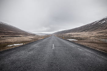 grey-sky-road-cold-mountains-fields-royalty-free-thumbnail.jpg