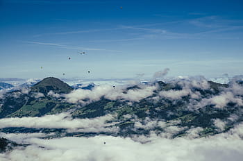 hot-air-balloons-blue-sky-clouds-royalty-free-thumbnail.jpg