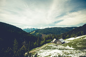 house-cottage-mountains-trees-grass-fields-royalty-free-thumbnail.jpg
